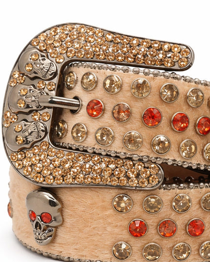 Decorative belt with rhinestones and skull designs on a white background