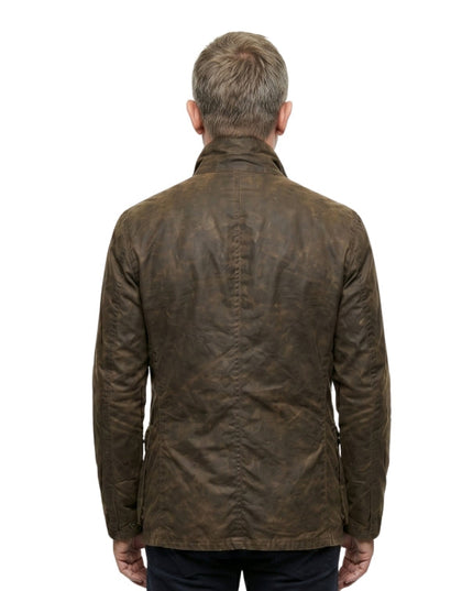 Brown leather jacket worn by a person on a white background
