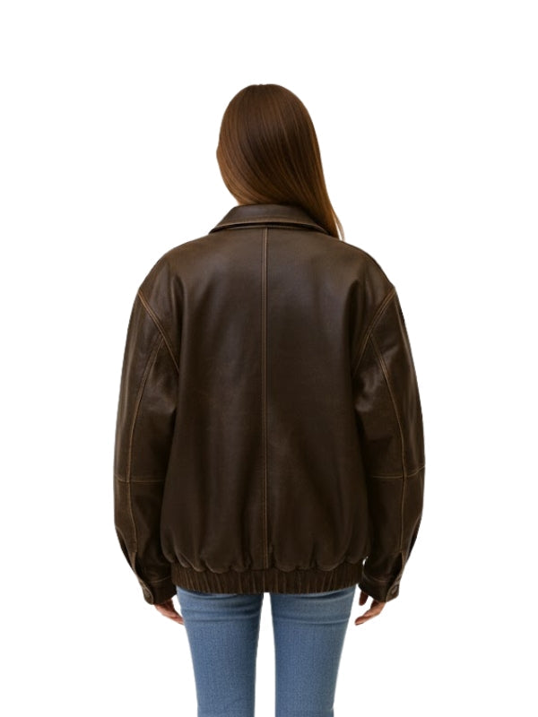 Person wearing a brown leather jacket on a white background