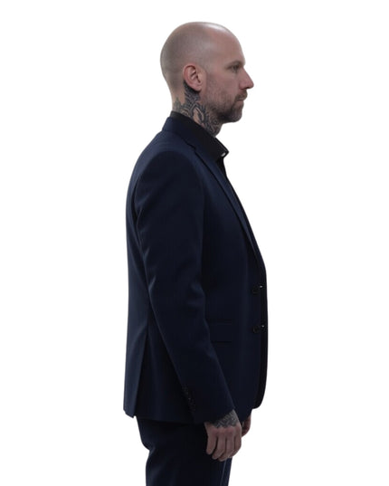Man wearing a dark suit jacket on a white background