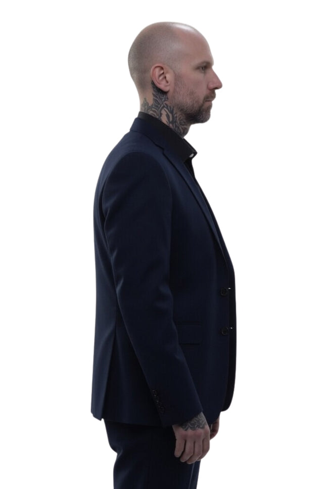Man wearing a dark suit jacket on a white background