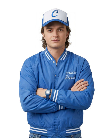 Person wearing a blue jacket with 'Coach Steve' text and a matching cap on a white background