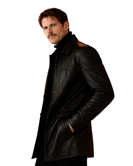 Man wearing a black leather coat on a white background