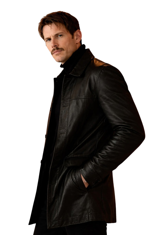 Man wearing a black leather coat on a white background