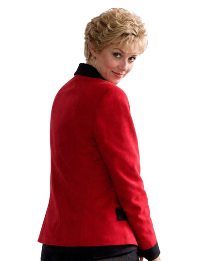 Woman wearing a red jacket with black trim on a white background