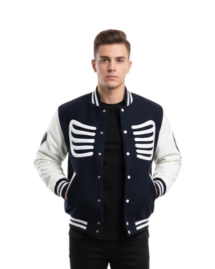 Man wearing a navy and white varsity jacket with skeleton design on a white background