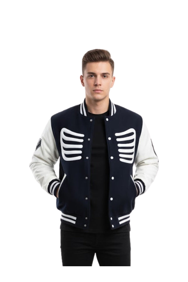 Man wearing a navy and white varsity jacket with skeleton design on a white background