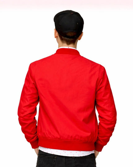 Person wearing a red jacket on a white background