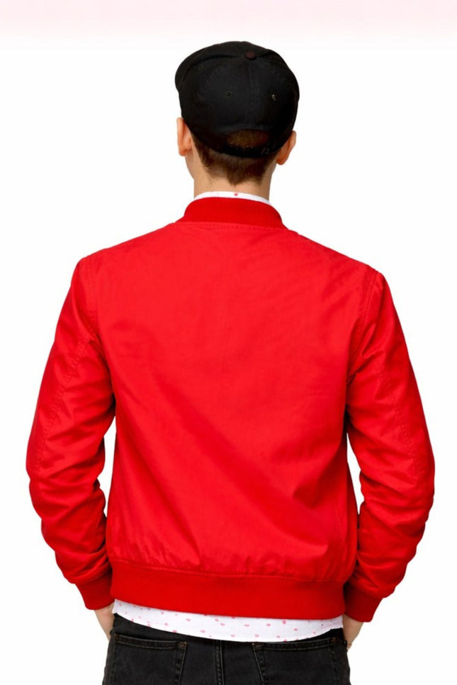 Person wearing a red jacket on a white background