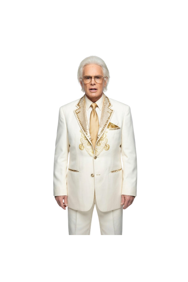 Man wearing a white suit with gold accents on a white background