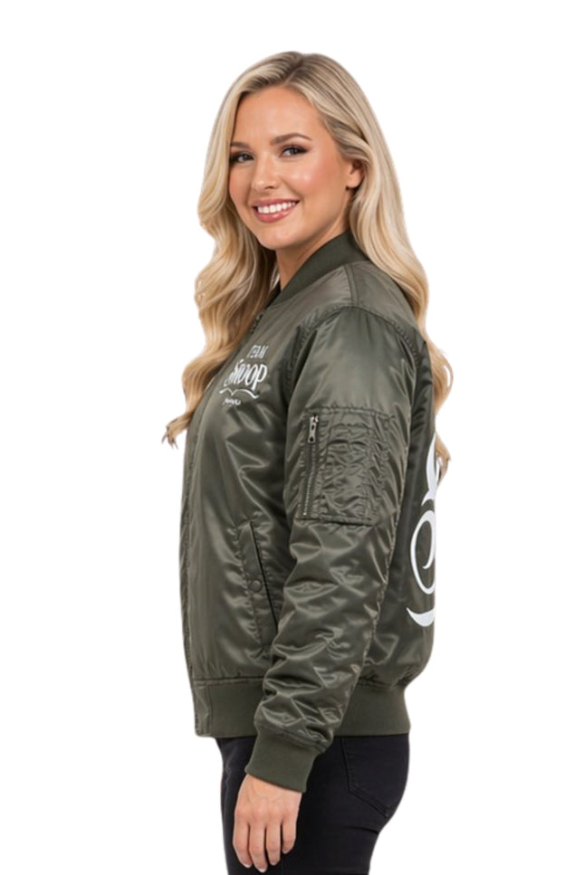 Woman wearing a green bomber jacket with branding on a white background