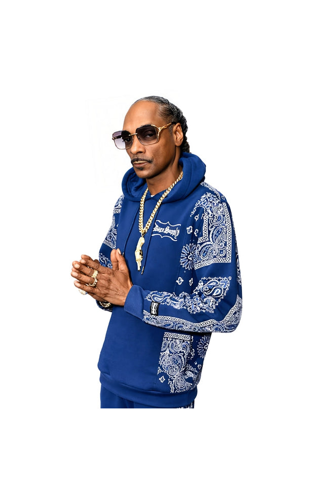 Person wearing a blue hoodie with white patterns on a white background