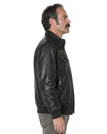 Man wearing a black leather jacket on a white background