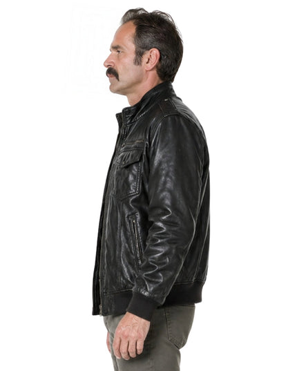 Man wearing a black leather jacket on a white background