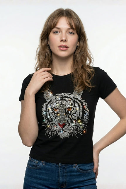 Woman wearing a black t-shirt with a tiger design on a white background