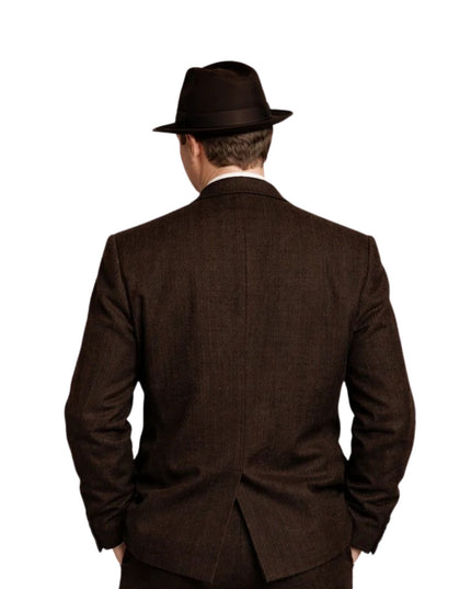 Man wearing a brown suit and hat from behind on a white background
