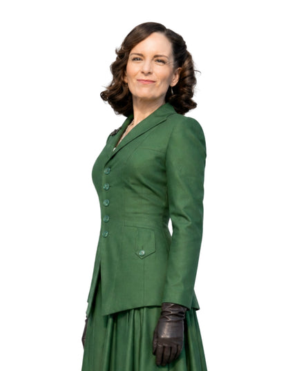 Woman wearing a green vintage-style suit on a white background