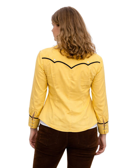 Person wearing a yellow jacket with black accents on a white background