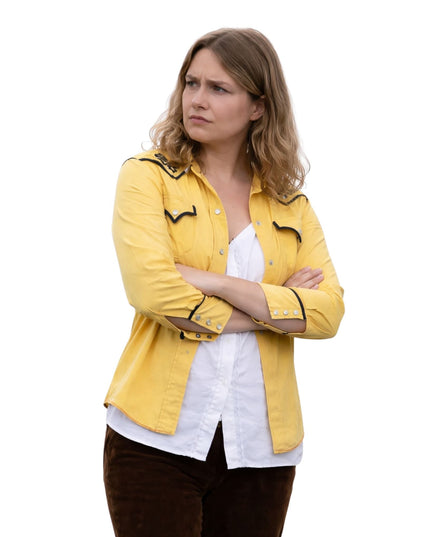 Woman wearing a yellow jacket with black accents on a white background