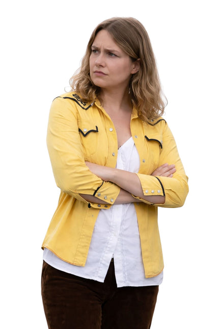 Woman wearing a yellow jacket with black accents on a white background