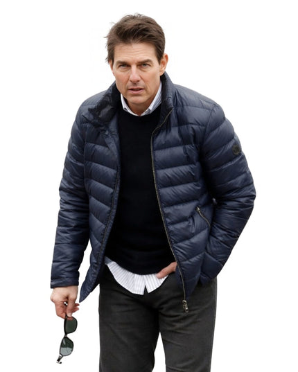 Man wearing a blue puffer jacket on a white background