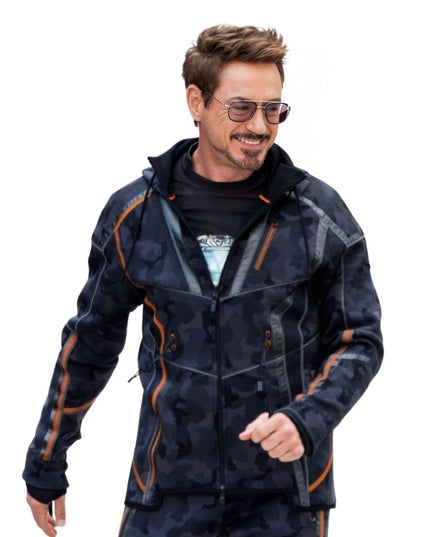 Man wearing a dark camouflage jacket with orange accents on a white background