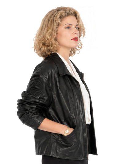 Person Wearing a black jacket on a white background 