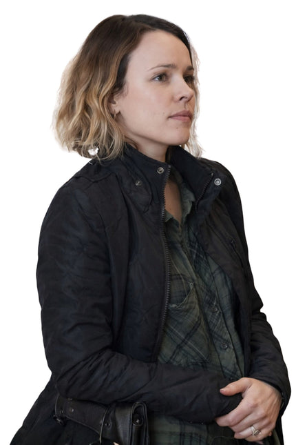 Woman wearing a black jacket on a white background