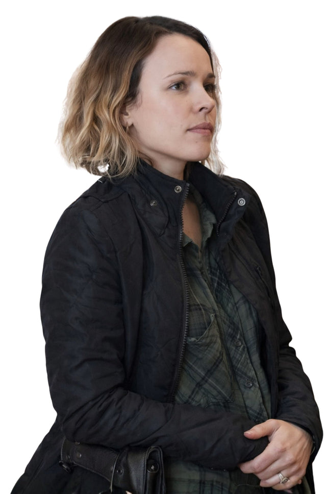 Woman wearing a black jacket on a white background