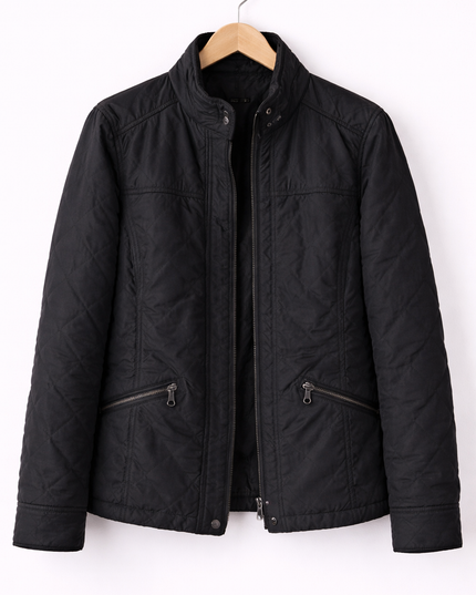 Black jacket on a hanger against a white background
