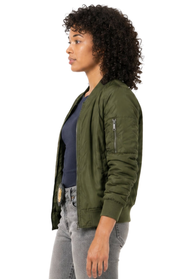 Woman wearing a green bomber jacket on a white background