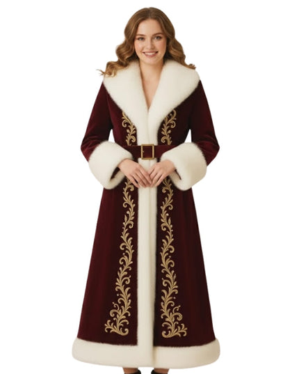 Woman wearing a long, ornate coat with white fur trim on a white background