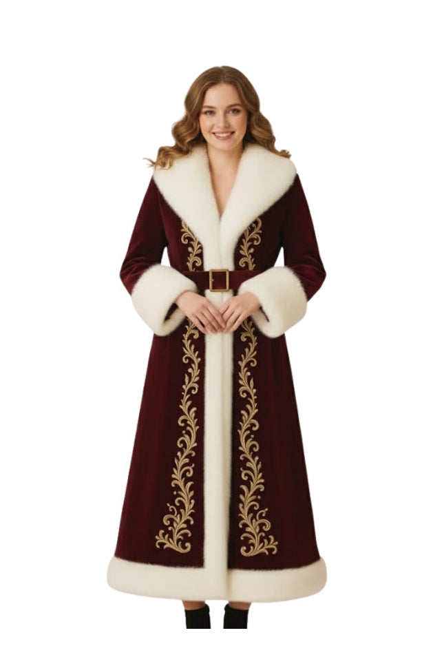 Woman wearing a long, ornate coat with white fur trim on a white background