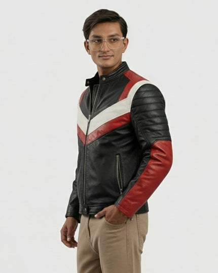 Man wearing a black and red leather jacket with white stripe on a gray background