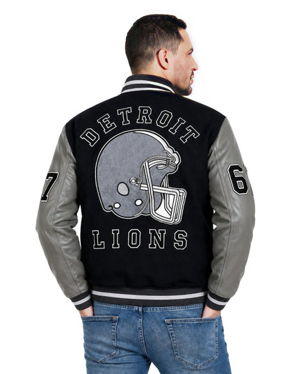 Man wearing a black and gray 'Detroit Lions' jacket with a helmet design on a white background