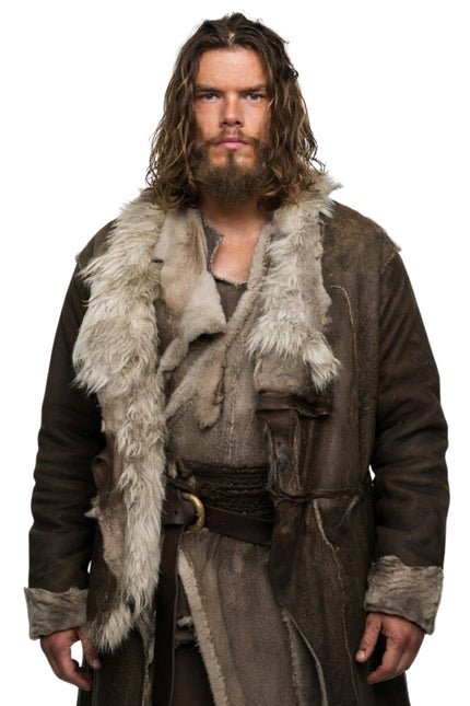 Man wearing a fur-lined coat with a white background