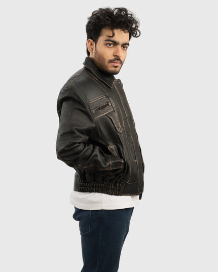Man wearing a dark brown leather jacket on a white background