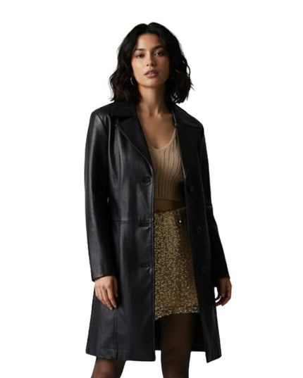 Woman wearing a black leather coat over a beige top and leopard print skirt on a white background