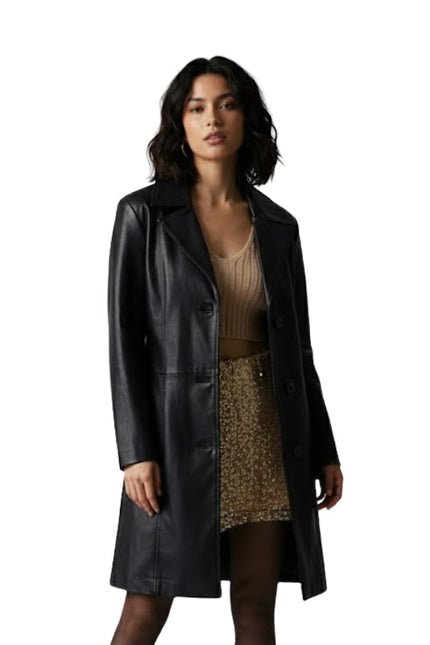 Woman wearing a black leather coat over a beige top and leopard print skirt on a white background
