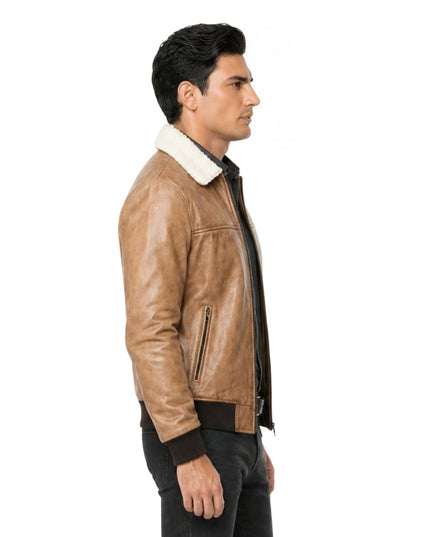Man wearing a brown leather jacket with white fur lining on a white background