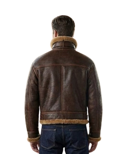 Man wearing a brown leather jacket with fur trim on a white background