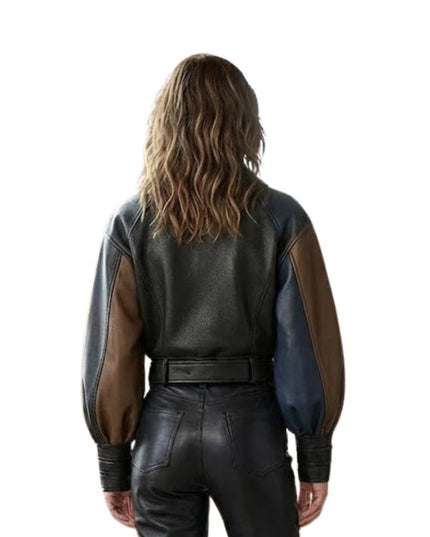 Person wearing a black and brown leather outfit with a white background