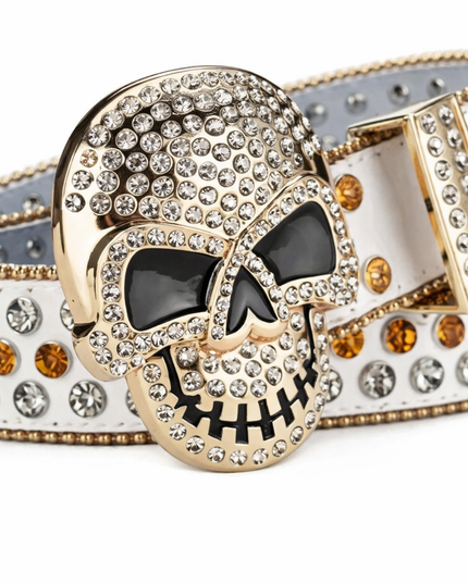 Decorative belt with a skull design and rhinestones on a white background