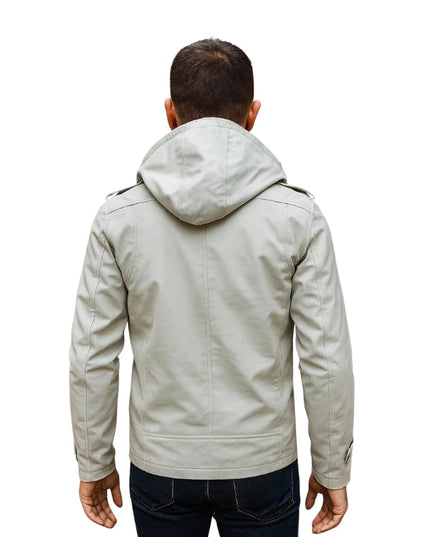 Person wearing a light gray jacket with a hood on a white background