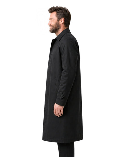 Man wearing a black coat on a white background