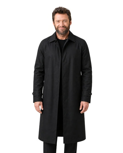 Man wearing a black coat on a white background