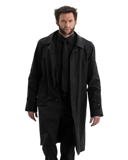 Person wearing a black coat on a white background 