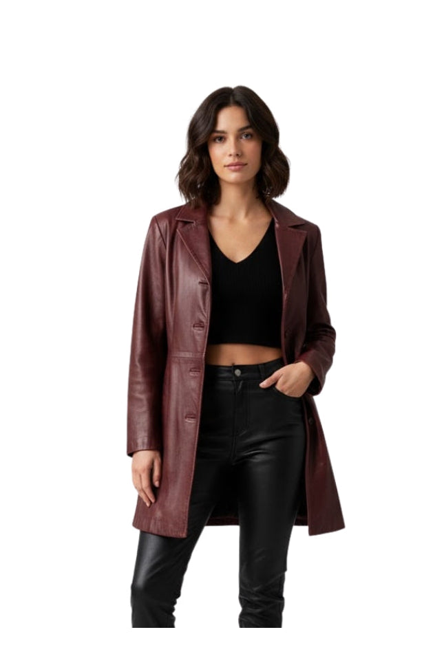 Woman wearing a burgundy leather coat on a white background