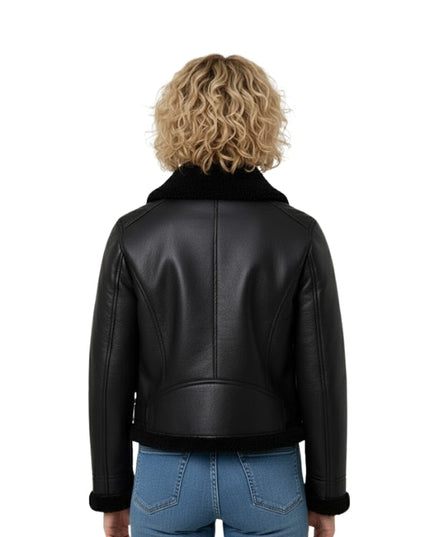 Person wearing a black leather jacket with a white background