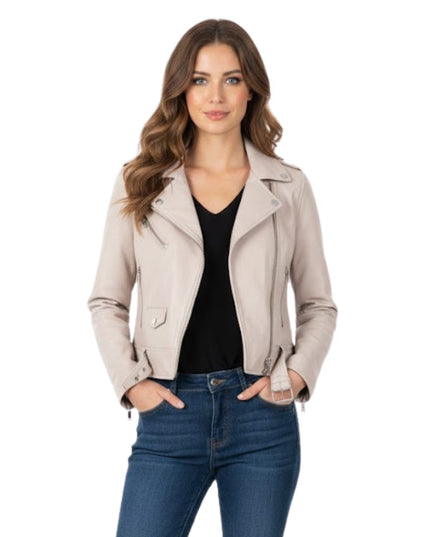 Woman wearing a beige jacket and blue jeans on a white background